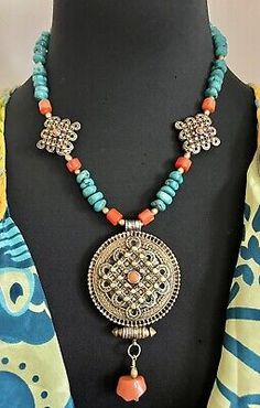 Golden bronze enameled Tibetan Nepalese Ghau With Turquoise And Coral Necklace.  | eBay Traditional Turquoise Jewelry With Large Pendant, Antique Beaded Jewelry For Festivals, Decorative Bronze Pendant Jewelry, Bronze Decorative Pendant Jewelry, Handmade Turquoise Ceremonial Necklaces, Traditional Handmade Turquoise Pendant Necklace, Traditional Turquoise Necklace With Large Pendant, Traditional Turquoise Jewelry For Gift, Traditional Turquoise Necklace With Large Pendant As Gift