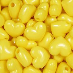 yellow heart shaped beads are shown in close up