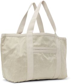 Coated linen-blend canvas tote in off-white. · Twin shoulder straps · Logo embroidered at face · Patch pockets at front and back · Open throat · Zip pocket at interior · H12.5 x W23 x D8.5 Supplier color: Ecru White Canvas Bag With Canvas Lining For Errands, White Cotton Shoulder Bag For Errands, Cream Canvas Bag With Pockets, Beige Cotton Canvas Bag For Errands, White Linen Travel Bag, Face Patches, Isabel Marant Etoile, Logo Embroidered, Isabel Marant