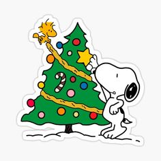 a snoopy christmas tree sticker on a white background with the peanuts character next to it