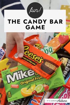 a pile of candy bars with the title overlay reading fun the candy bar game