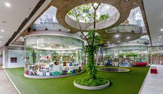 the inside of a building with plants growing in it