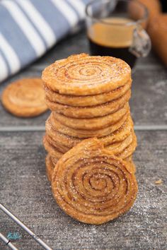 puff pastry pinwheel cookies stacked on top of each other