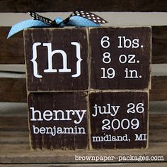 a wooden block with the birth date on it