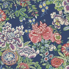 a blue floral wallpaper with red, pink and green flowers