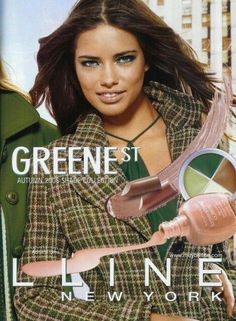 a magazine cover featuring a woman with green eyeshade and lipstick in her hand