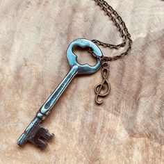 This skeleton key is beautifully classic. I wonder what secrets it holds? All of my skeleton keys are authentic, not reproductions. The keys are unique with flaws, as they are vintage and recycled with a whole new purpose. They each have a story all their own, because no two keys are identical. This piece would make a lovely gift for anyone. It comes knotted on a vegan leather cord, your choice of black/brown, or on the chain of your choice. I personally love it on the bronze chain with the clover charm.  This necklace will be custom just for you! Your necklace will be shipped in a drawstring pouch, perfect for simple gift giving.  Stay updated on new products & promotions: Follow my Instagram @Creativia.Handmade Facebook: www.facebook.com/creativiahandmade Steampunk Key, Skeleton Key Necklace, Vintage Skeleton Keys, Vintage Skeleton, Skeleton Keys, Key Jewelry, Simple Gift, Clover Charm, Key To My Heart