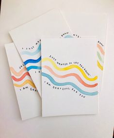 three greeting cards with colorful wavy lines on them, one has the words i am grateful for you