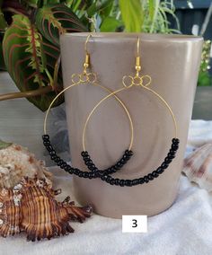 Trendy Handmade Black Hoop Earrings, Trendy Black Beaded Earrings For Gift, Black Beaded Small Hoop Earrings As Gift, Small Black Hoop Earrings For Jewelry Making, Adjustable Black Beaded Hoop Earrings, Adjustable Hoop Earrings With Black Beads, Gift Hoop Earrings With Dangling Beads, Adjustable Black Beaded Hoop Jewelry, Black Beaded Hoop Earrings Gift