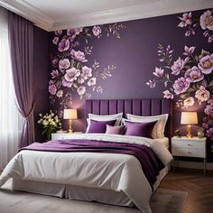 a bedroom decorated in purple and white with flowers on the wall above the bed, along with two nightstands