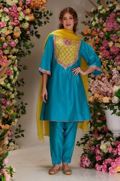 Turquoise short A-line kurta featuring gota, moti and sequin embellishment. Paired with a salwar and a yellow sheer dupatta. - Aza Fashions Elegant Turquoise Set With Dupatta, Elegant Turquoise Festive Set, Festive Turquoise Sets For Reception, Fitted Blue Dupatta With Dori Work, Turquoise Kurta With Resham Embroidery For Wedding, Blue Palazzo Set With Dori Work, Blue Silk Lehenga With Dabka Work, Fitted Blue Set With Dori Work, Designer Turquoise Sets With Resham Embroidery