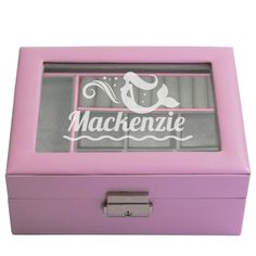 a pink jewelry box with the word mackenzie on it's glass window