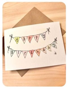 a handmade happy birthday card with bunting flags