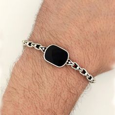 The bracelet is handmade and embellished with stunning black onyx. PRODUCT FEATURES -Products are sent with free shipping as boxed and bagged. - Crafting Mine: 925k silver - Stone: Black Onyx - Chain link width: 4.5 mm - Weight 15-18 gr. - Bracelet Dimensions Height 25 mm - Width 18 mm Instead of black onyx stone, the name can be written on the bracelet, a picture can be put on it, and it can be customized as you wish. Your opinions are valuable for us. Please don't forget to leave us a positive Black Bracelet For Men, Mens Silver Bracelets, Bracelet For Men Silver, Silver Bracelets For Men, Mens Sterling Silver Bracelets, Mens Sterling Silver Jewelry, Mens Bracelet Black, Mens Silver Jewelry, Mens Bracelet Silver