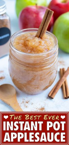 the best ever instant pot apple sauce in a mason jar with cinnamon stick sticking out of it