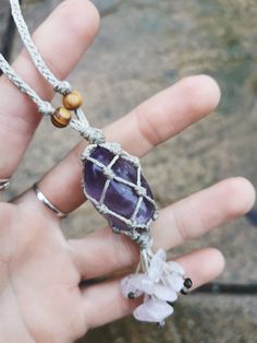 Handmade macrame car charm decoration with amethyst tumble stone and rose quartz beads ️ All jewellery and accessories are made by me :) AMETHYST Chakra alignment: third eye Birthstone: Pisces, Virgo, Aquarius and Capricorn Amethyst is an extremely calming stone known to relax the mind, relieve stress and help anyone that's feeling low. It is known as a master healer and highly cleansing. It is a really effective soothing stone also used for psychic and spiritual development. Used to block geopathic stress and negative energy. Amethyst is known to boost the immune system and also treating bacterial infections. It's said to help treat skin conditions including acne. ROSE QUARTZ Birthstone: Taurus Chakra Alignment: Heart Rose Quartz works with the Heart Chakra. It is highly known as the ston Purple Hippie Jewelry For Gift, Purple Hippie Jewelry For Gifts, Hippie Style Purple Jewelry For Gift, Adjustable Bohemian Lavender Crystal Necklace, Macrame Crystal Car Charm, Virgo Aquarius, Pisces Virgo, Crystal Car Charms, Amethyst Chakra