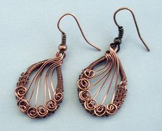 Hand Woven Antique Copper Wire Earrings by MontourDesigns on Etsy Handmade Antique Copper Earrings, Bronze Wire Wrapped Earrings, Bronze Wire Wrapped Teardrop Earrings, Bohemian Oval Wire Wrapped Earrings, Oval Bronze Copper Jewelry, Elegant Brown Copper Wire Jewelry, Bronze Teardrop Jewelry In Copper Wire, Artistic Earrings, Wire Wrap Jewelry Designs