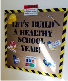 a bulletin board that says, let's build a healthy school year