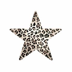 a leopard print star ornament is shown on a white background with black spots