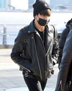 BTS Jungkook Black Leather Jacket - K-pop Airport Fashion Outfit BTS Golden Maknae Jungkook is well known for not only his talent and love for armies but also for his fashion style. Often showcasing versatile outfits, Jungkook effortlessly switches between different styles, ranging from formal wear to a more laid-back, relaxed style to urban hip-street wear. The Euphoria singer is seen incorporating leather jackets, boots, cargo pants, and loose tees into his outfits. Rev up your style with a Ju Casual Winter Biker Jacket For Concerts, Casual Fall Biker Jacket For Concerts, Trendy Winter Outerwear For Concerts, Black Biker Outerwear For Concerts, Winter Concert Biker Jacket With Long Sleeves, Winter Concert Biker Outerwear, Biker Style Winter Concert Outerwear, Winter Biker Outerwear For Concert, Winter Biker Jacket For Concerts