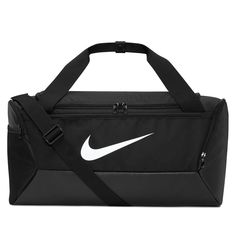 Nike BrasiliaTraining Duffel Bag (Small, 41L)Hit the gym with the duffel bag made to hold all your gear. The ventilated side compartment separates your smelly shoes from your post-sweat-sesh clothes. Get quick access to your phone or keys with the zippered front pocket when you're on the go. Toss it in your locker, next to the power rack and, when you're done, in your car—the coated bottom helps shield your things from bumps, scrapes and spills.Spacious zippered main compartment provides easy access to your gear.Inner zippered pocket stashes your valuables.Adjustable shoulder strap and dual handles give you comfortable carrying options.Ventilated side pocket keeps dirty shoes and sweaty clothes separate from your clean gear.Side pockets hold a water bottle or other small essentials.More De Nike Gym Bag, Nike Duffle Bag, Smelly Shoes, Soccer Bag, Small Duffle Bag, Sport Nike, Nike Bags, Gianfranco Ferre, Training Gear