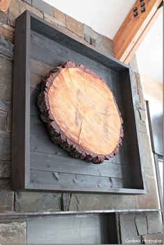 a large piece of wood sitting on top of a wooden shelf