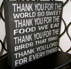 a wooden sign that says thank you for the world so sweet, thank you for the food we eat