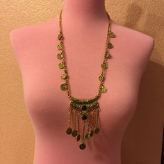 This Antique Style Rustic Gold Color Boho Statement Dangly Coin Tassel Necklace Is A Wonderful Addition To Your Wardrobe And Your Style! A Powerful Statement And Conversation Piece! Green Metal Necklace For Festival, Green Metal Necklaces For Festivals, Bohemian Green Metal Necklace, Aries Necklace, Heart Costume, Silhouette Necklace, Abstract Pendant, Velvet Choker Necklaces, Boho Statement Necklace