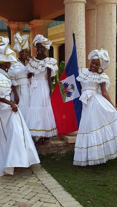 ((Mercedes...her second dress... 'cause she gotta have at least two...at *least*--/SHOT)) Haitians in Karabela dresses Carribean Traditional Outfits, Haitian Cultural Clothing, Traditional Haitian Dress, Dominican Traditional Dress, Haitian Culture Outfit, Traditional Haitian Clothing, Cuban Traditional Dress, Caribbean Traditional Dress, Haitian Karabela Dress