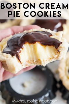 boston cream pie cookies with chocolate drizzled on top and in the foreground