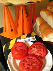 bread and tomatoes are on plates next to each other