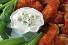 chicken wings with dip and celery on the side