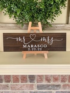 a wooden sign that says mr and mrs on it