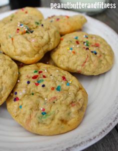 cookies with sprinkles on a white plate