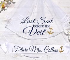 a wedding veil with an anchor and the words last sail before the veil