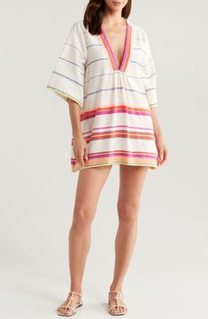 Hand spun and woven in Ethiopia, this colorful cover-up will be your constant companion at the beach or pool. 33" length (size medium) Deep V-neck Elbow-length sleeves 95% cotton, 5% acrylic Dry clean Made in Ethiopia Black Owned/Founded Striped Beachwear Dresses For Vacation, Striped Beach Dress For Vacation, Woven Summer Beach Dress, Woven Beach Dress For Summer, Woven Beach Dresses For Summer, Summer Striped Beach Dress, Striped Beachwear Dresses For Beach, Striped Beach Dress For Beach Season, Beachwear Striped Beach Dress