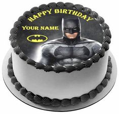 a batman birthday cake with an image of the bat