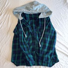 Nwot Adorable Casual Button Down Flannel Top. Grey Hoody Attached With Drawstrings. Cozy And Warm But Feels Like A Flannel T-Shirt. Fits Medium-Large. ~ ~ ~ ~ Flannel Button-up Top With Pockets, Blue Flannel Button-up Top, Cheap Button-up Flannel Shirt With Snap Buttons, Flannel Blouse, Flannel Tops With Snap Buttons, Long Sleeve, Cheap Blue Button-up Flannel Shirt, Blue Button-up Flannel Shirt With Snap Buttons, Flannel Tops, Large Buttons