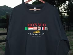 Classic sweatshirt with ribbed crew neck and soft fleece inside. Features a fully embroidered Monaco Racing Club design on the front. * 100% cotton face * 65% cotton, 35% polyester fleece inside * Double-needle stitched rib collar, cuffs, and hem WE RECOMMEND: * Order one size up for a more relaxed fit * Machine wash cold and hang dry or tumble dry with low heat Made to order. Designed by racers and motorsports enthusiasts in Laguna Beach, California.  Please reach out to us if you have any issu Crew Neck Sweatshirt With Embroidered Logo, Monaco Sweatshirt, F1 Clothing, Racing Clothes, Vintage Monaco, Car Sweatshirt, Car Clothing, F1 Merch, Racing Hoodie