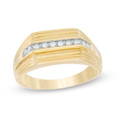 A sleek and handsome style, this diamond wedding band is a stylish keepsake for him. Crafted in warm 10K gold, this handsome ring features a row of sparkling channel-set diamonds along the center, while the ring's slanted and grooved design adds dimension to the band. Radiant with 1/4 ct. t.w. of diamonds, this ring is buffed to a brilliant shine. Silver Engraved Bracelet, Handsome Style, Silver Rings Simple, Signet Ring Men, Peoples Jewellers, Silver Jewelry Design, Engagement Rings For Men, Diamond Wedding Band, Size 10 Rings