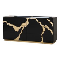 a black and gold dresser with an abstract design on the front, two drawers and one door