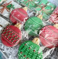 decorated christmas cookies in plastic wrappers on display