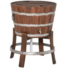 a wooden barrel sitting on top of a metal stand