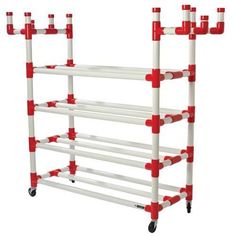 a rack with red and white pipes on it's sides is shown in front of a white background