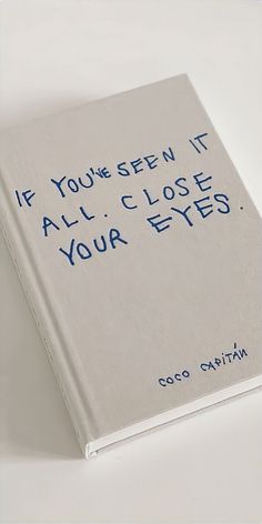 a white book with blue writing on the front and back cover that says, if you're seen it all close your eyes