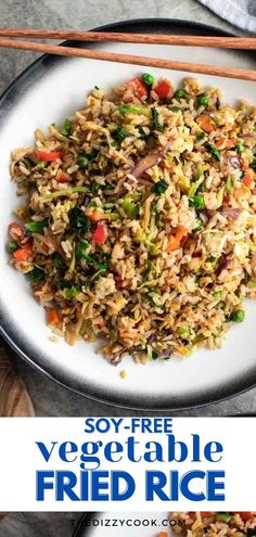 vegetable fried rice with chopsticks on the side in a white plate and text overlay that reads soy free vegetable fried rice