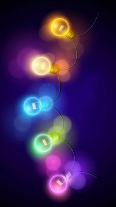 an image of colorful light bulbs in the dark