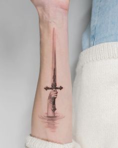 Hand emerging out of water holding dagger sword forearm wrist tattoo Swords Tattoo Men Forearm, Broadsword Tattoo, Gladiator Tattoo Swords, Matching Tattoo Swords, Hand Holding Dagger Reference, Dagger Arm Tattoo, Fantasy Dagger Tattoo, Forearm Dagger Tattoo, Longsword Tattoo