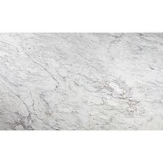 a white marble counter top with grey veining