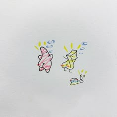 an image of two cartoon animals on a white paper sheet with colored crayons